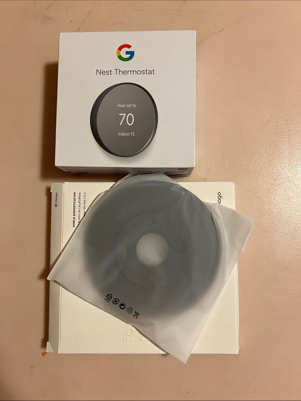Google Nest Thermostat in Charcoal with wall mount